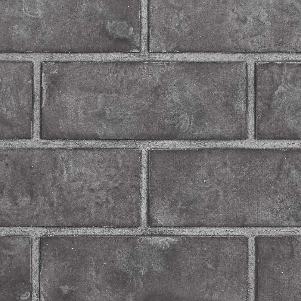 Decorative brick panel in dark gray with rectangular blocks and mortar lines