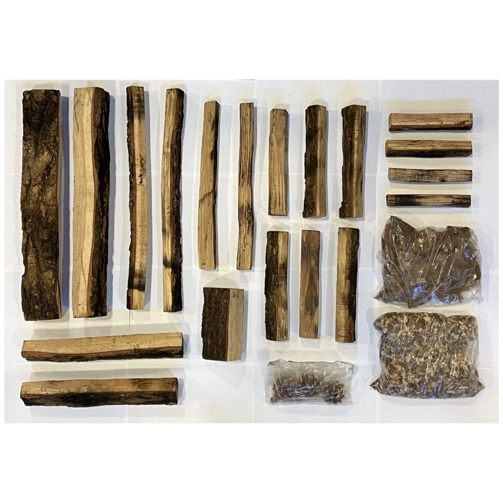 Real wood media kit with assorted timber logs and rock pieces in bags