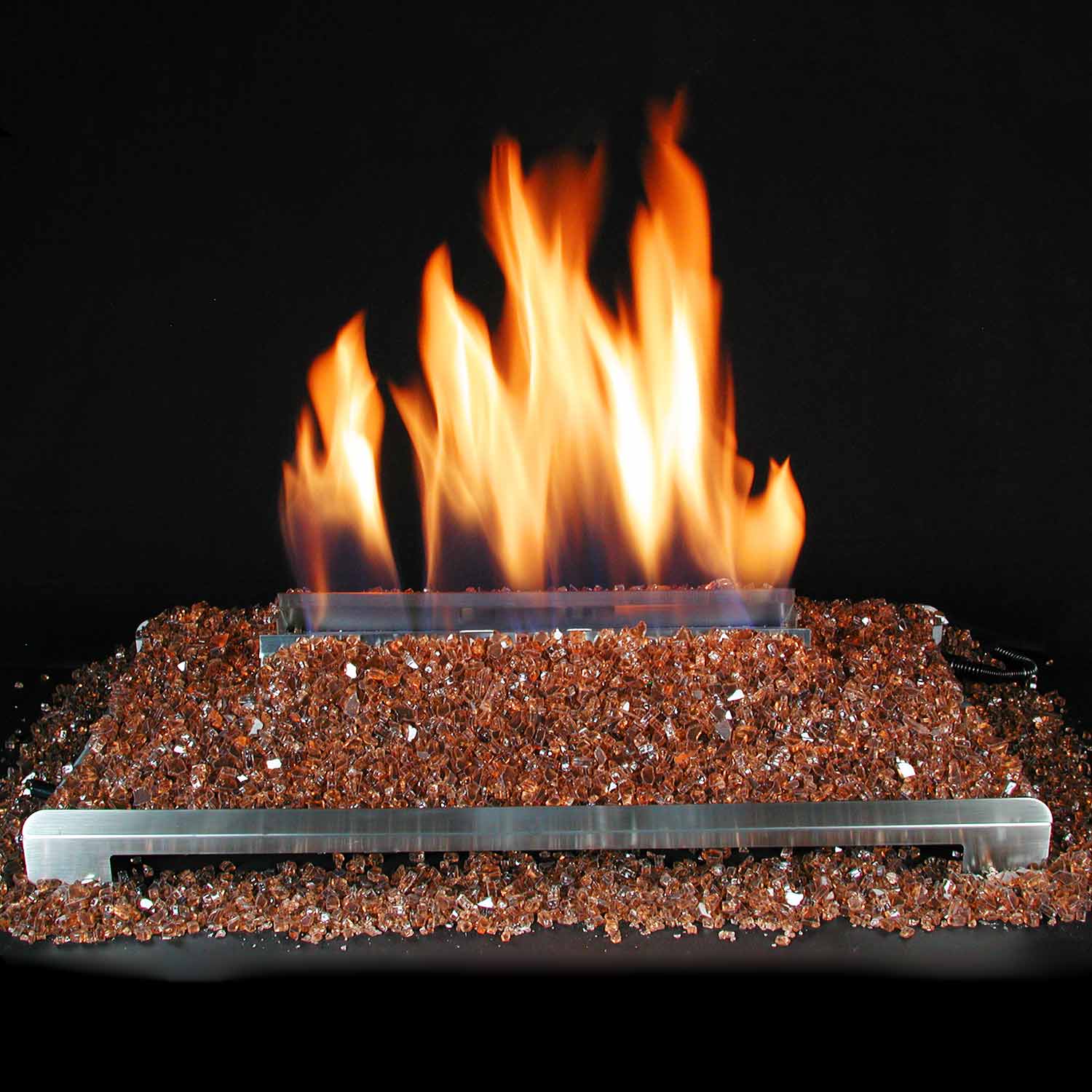Ventless burner kit with flames above copper-toned fire glass media bed