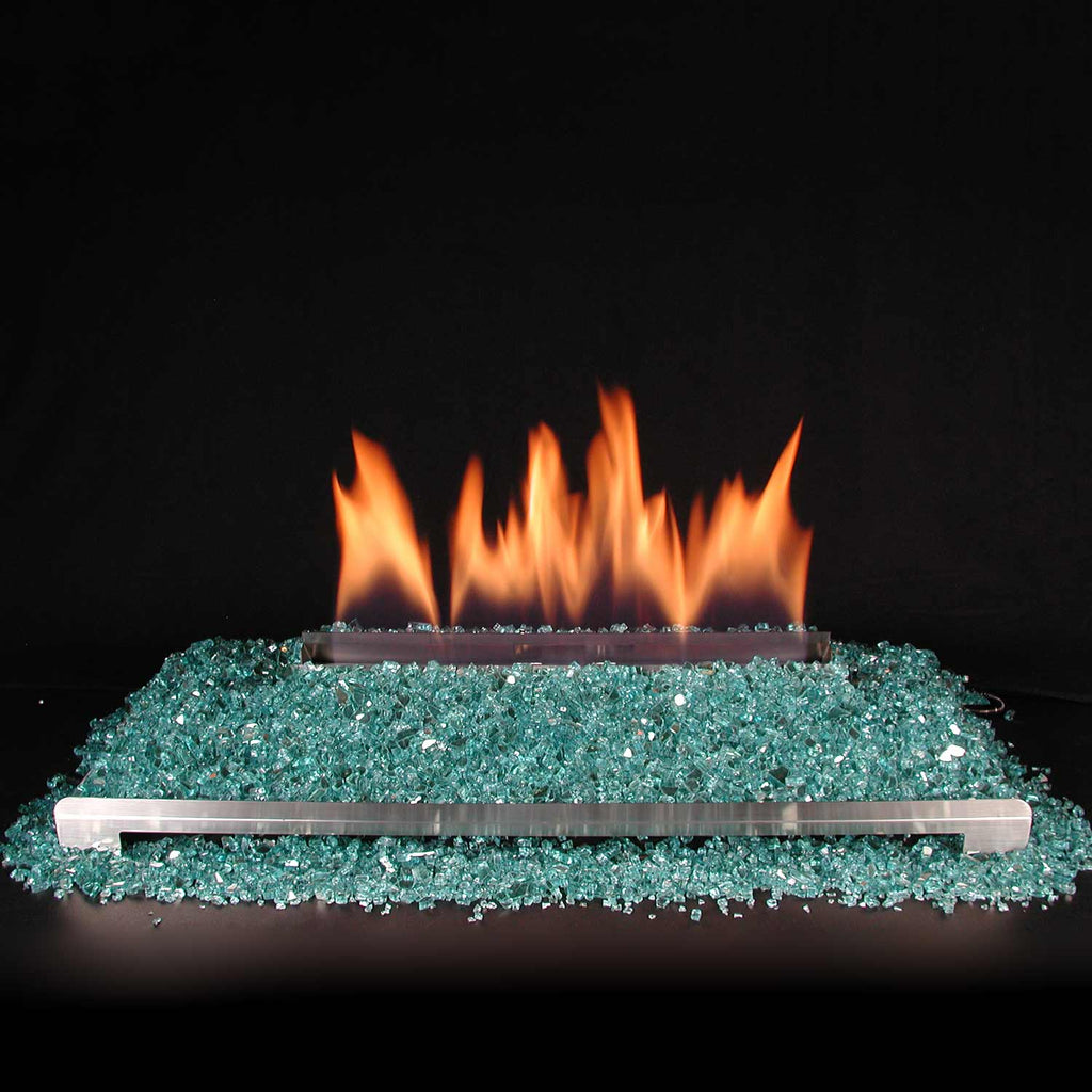 Ventless burner kit with flames above teal-blue fire glass media bed