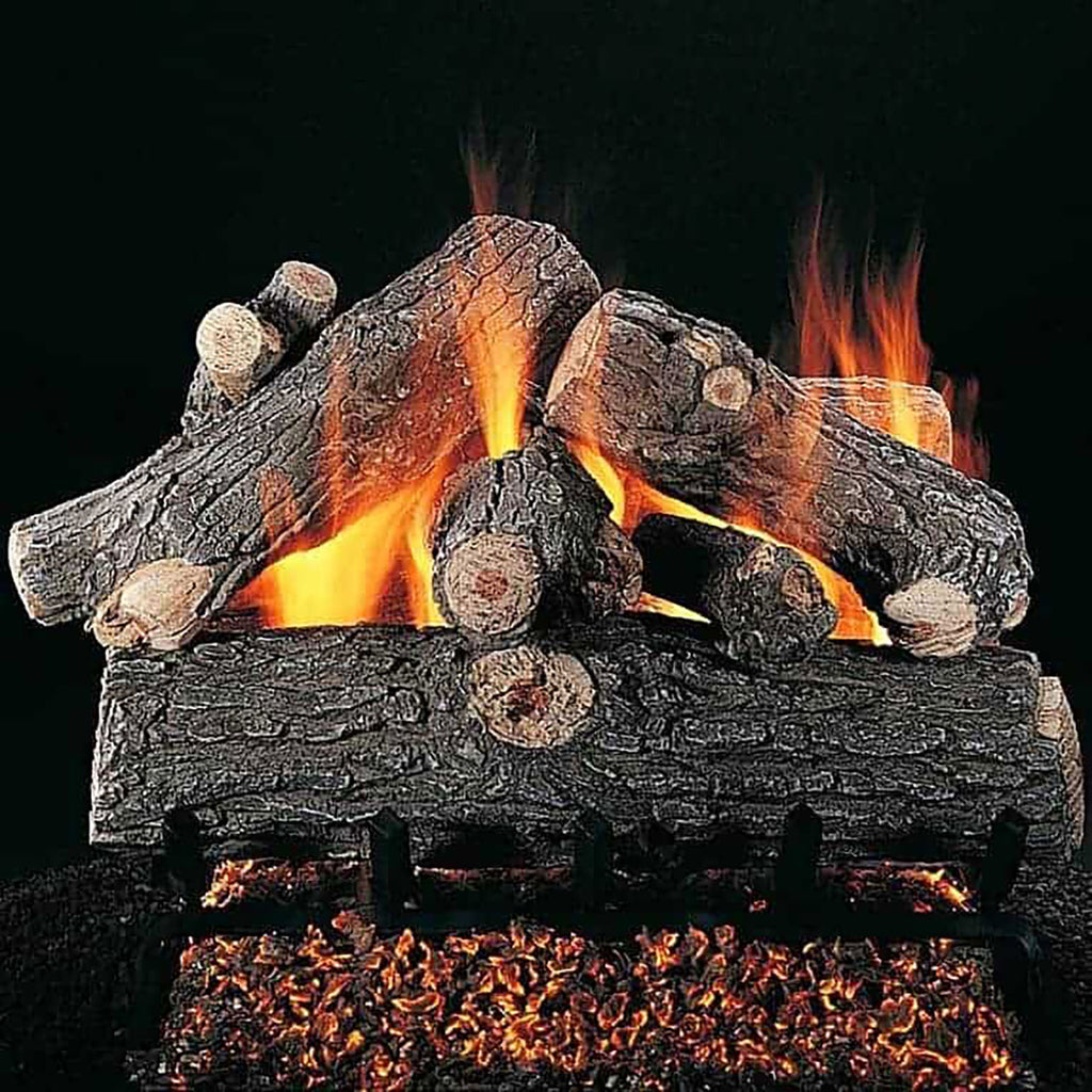 Gas log set with burning flames and charred oak-style logs