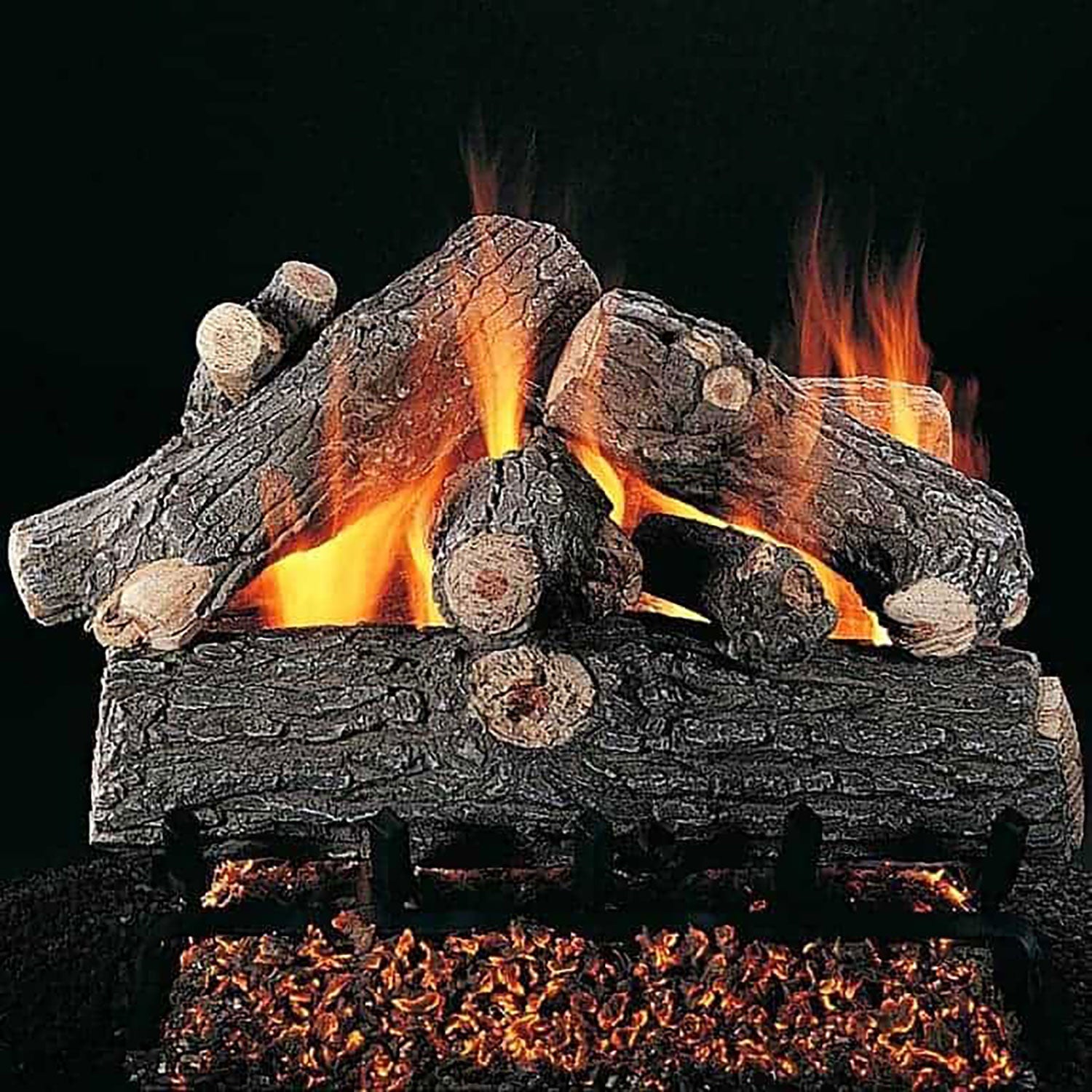 Gas log set with burning flames and charred oak-style logs