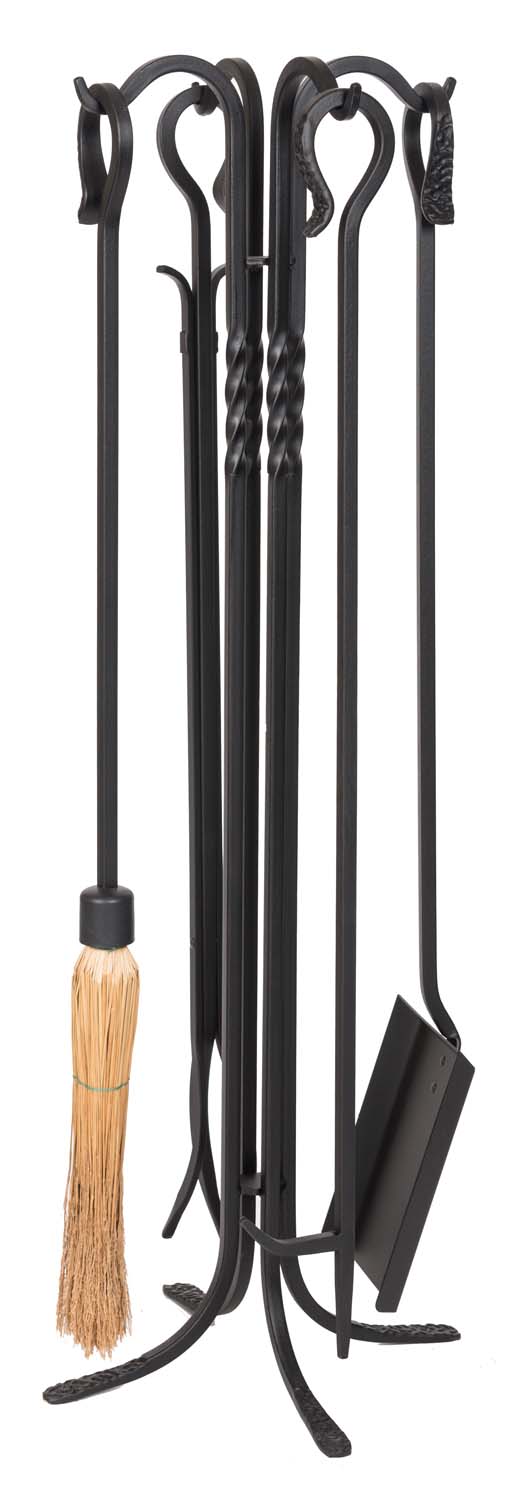 Black wrought iron fireplace tool set with stand, including broom and shovel