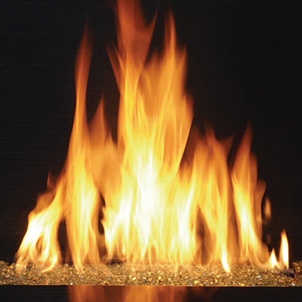 Close-up of bright orange flames over dark crushed glass media in fireplace