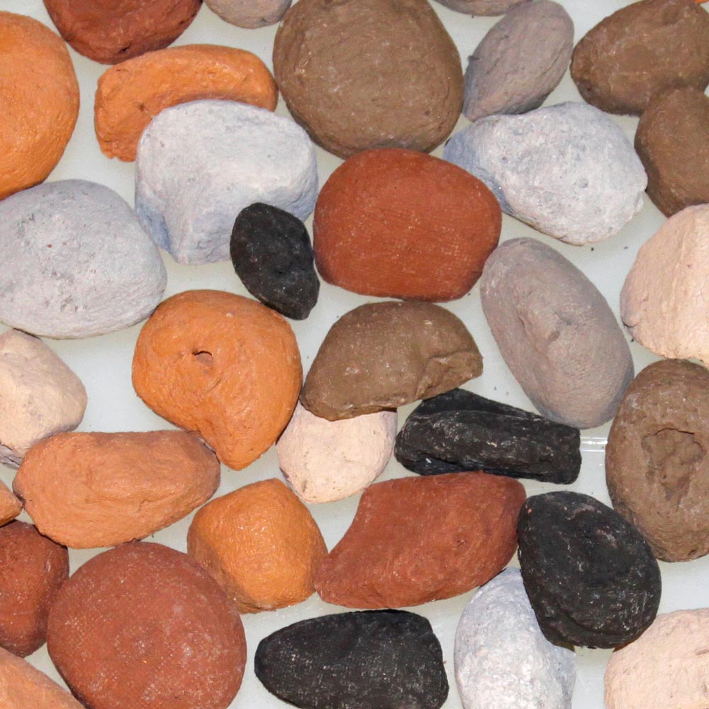 Decorative pebble assortment of mixed stones in orange, brown, black, white, and gray