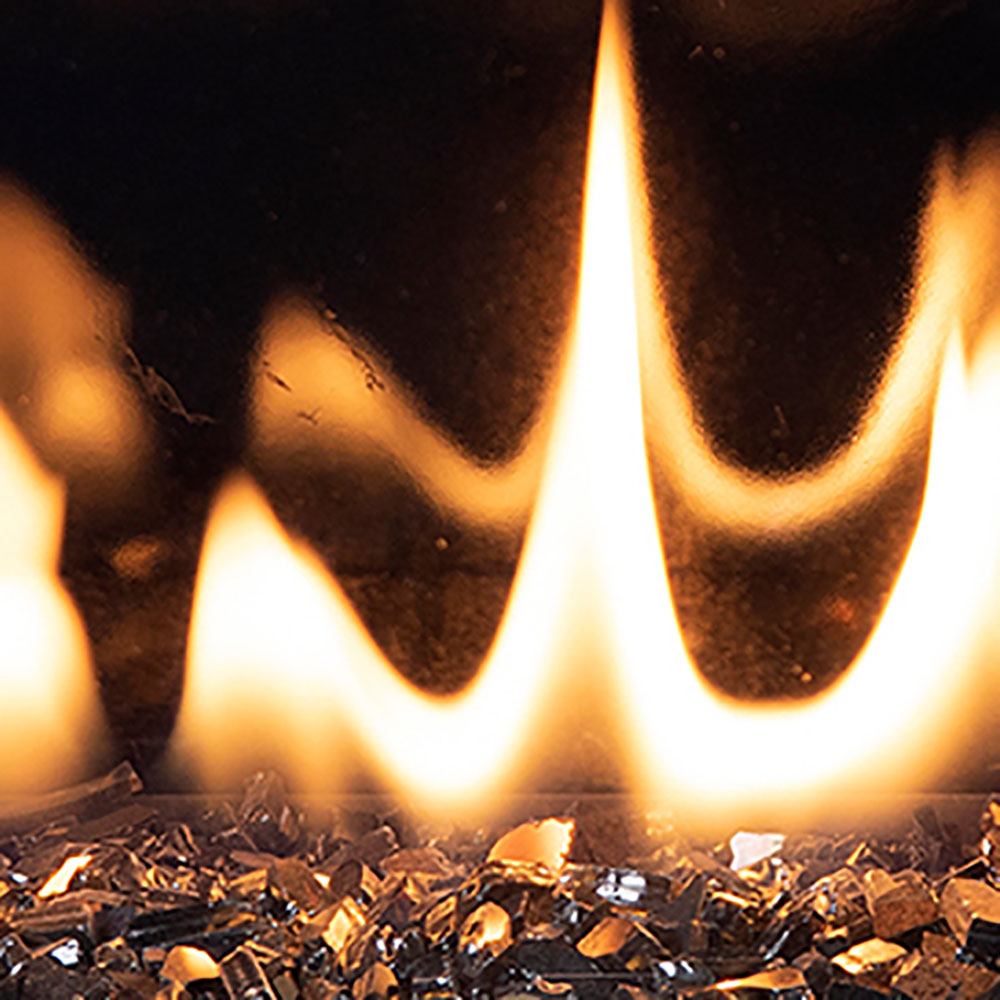 Crushed glass media for gas fireplace with tall bright flames and glowing embers