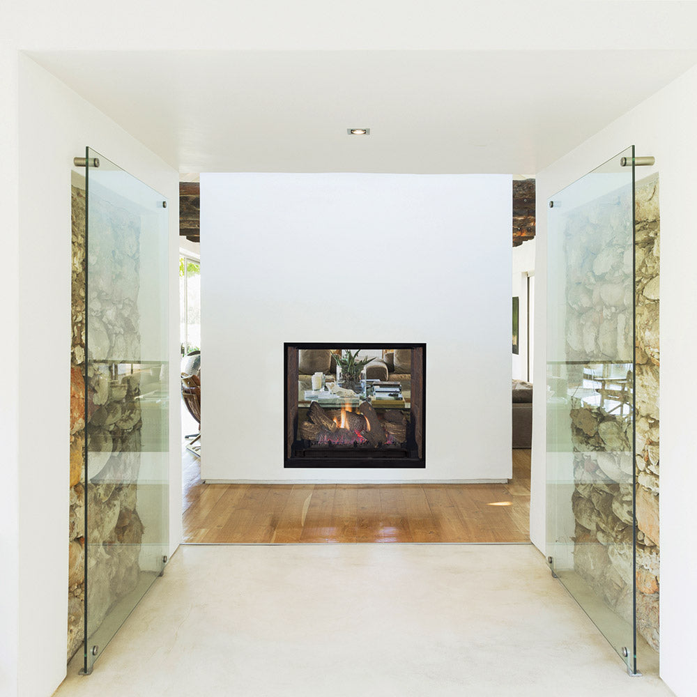 Direct vent gas fireplace installed with clear glass side panels and flame view