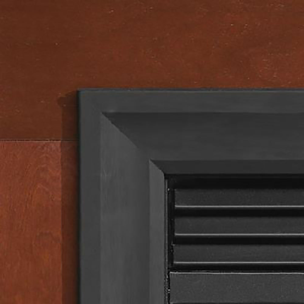 Matte black steel fireplace frame, close-up corner and interior rails
