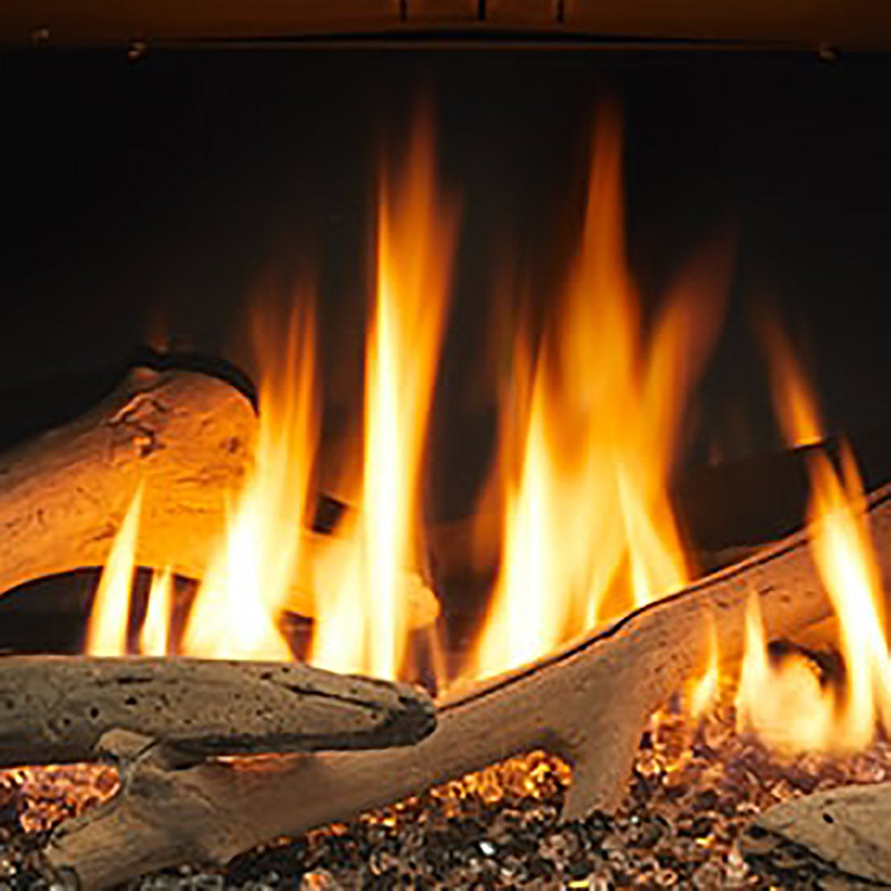 Wood log set with glowing embers and tall open flames