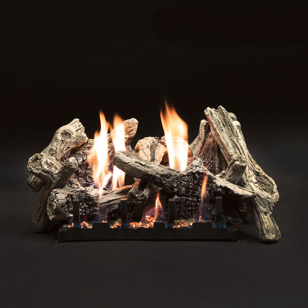 Fireplace log set with tall flames and large gray driftwood-style logs on a grate
