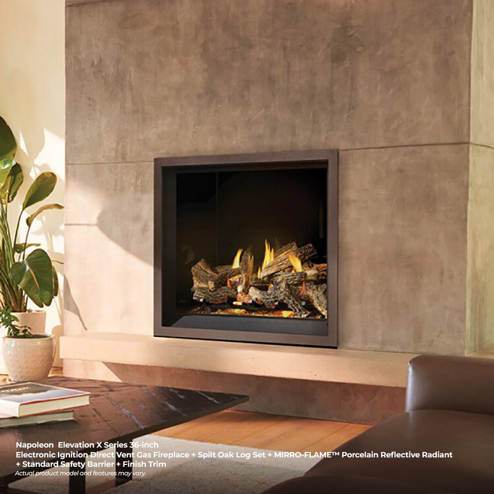 36-inch direct vent gas fireplace in a stone surround with burning logs