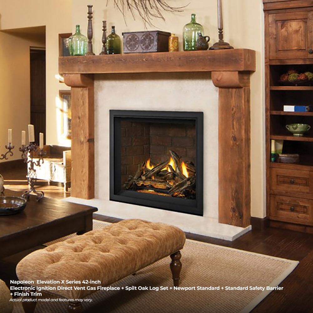 Direct vent gas fireplace with black framed insert and burning logs inside a wood mantel