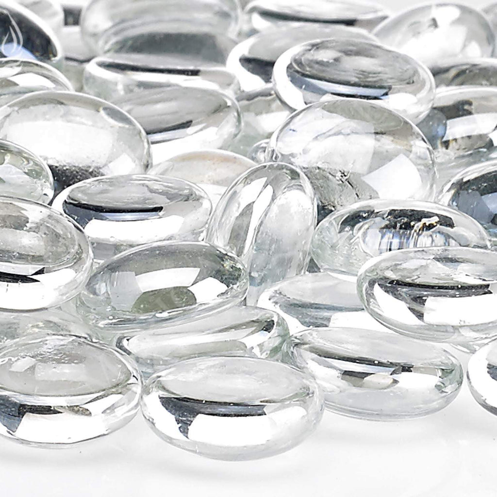 Close-up of clear round glass fire beads with glossy reflective surfaces