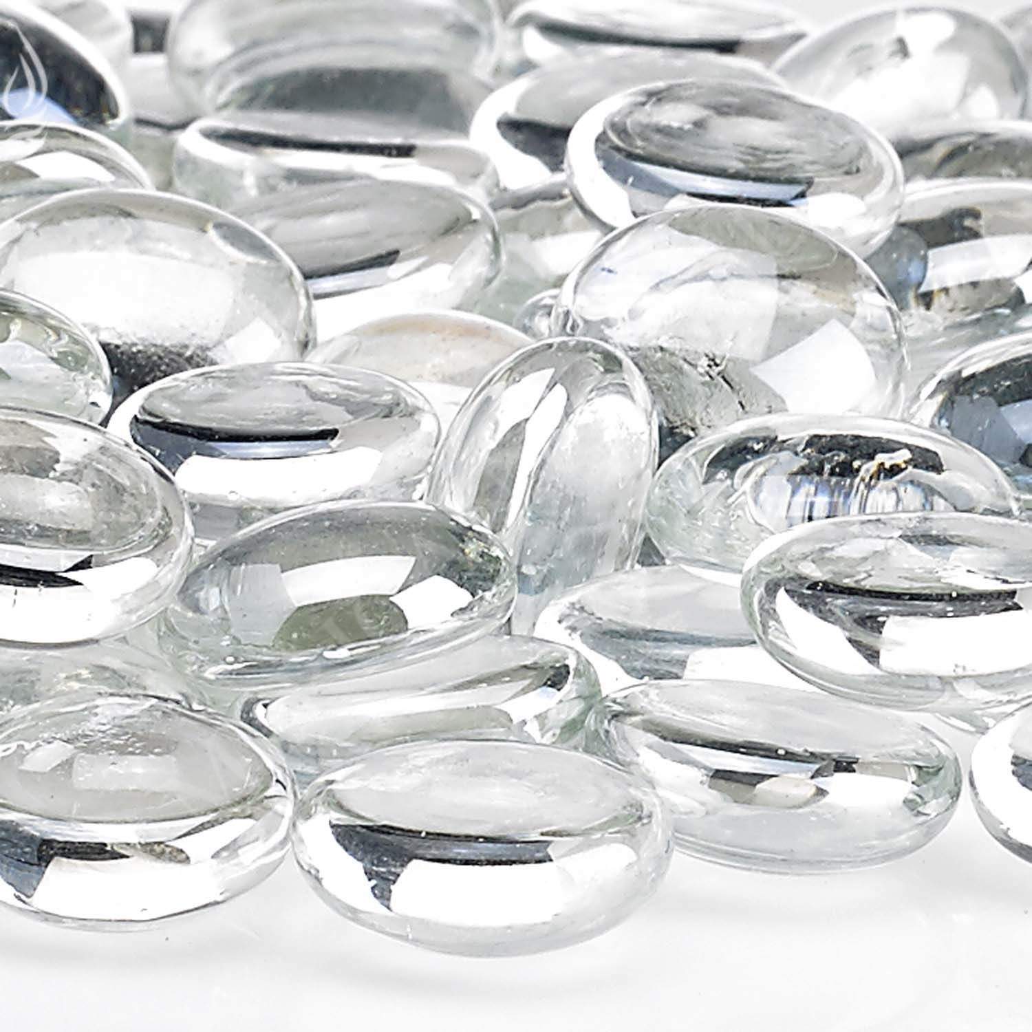 Close-up of clear round glass fire beads with glossy reflective surfaces