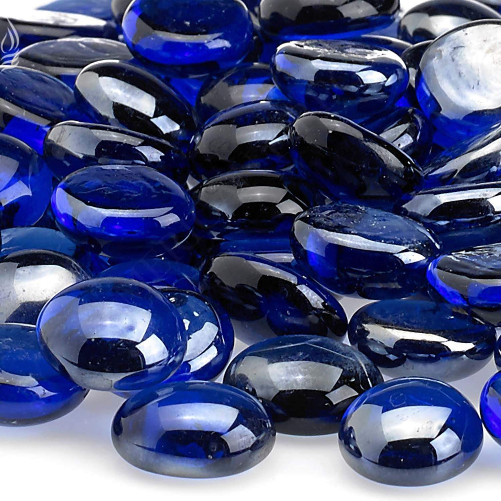 Close-up of round royal blue glass fire beads with glossy, reflective finish