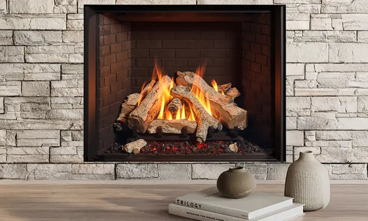 Stone-surround gas fireplace with glowing flames and warm living room setting