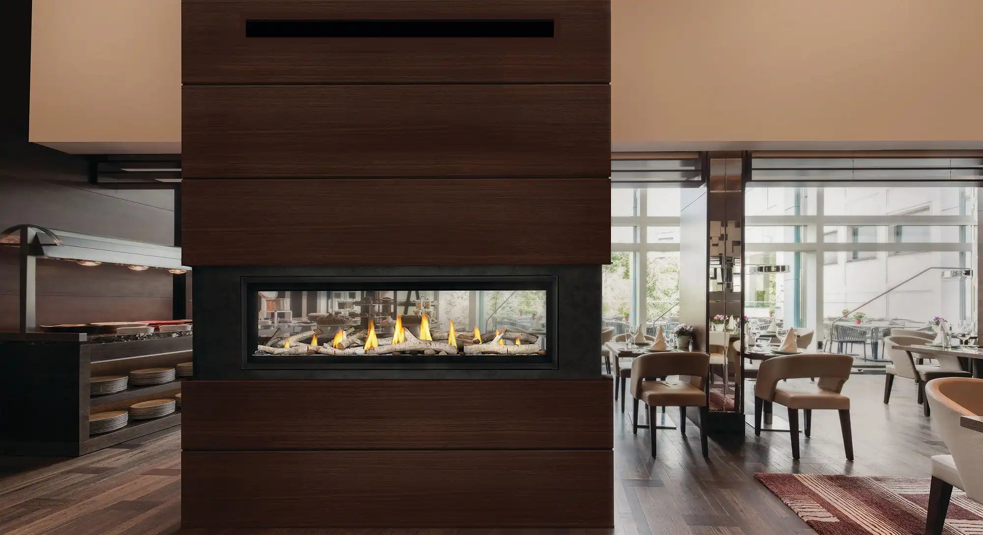 Modern see-through fireplace in a pillar in the middle of a modern dining space