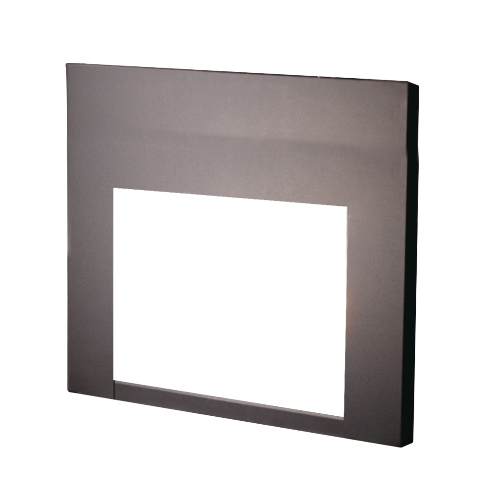 Dark metal gas fireplace insert facade panel with square cutout opening