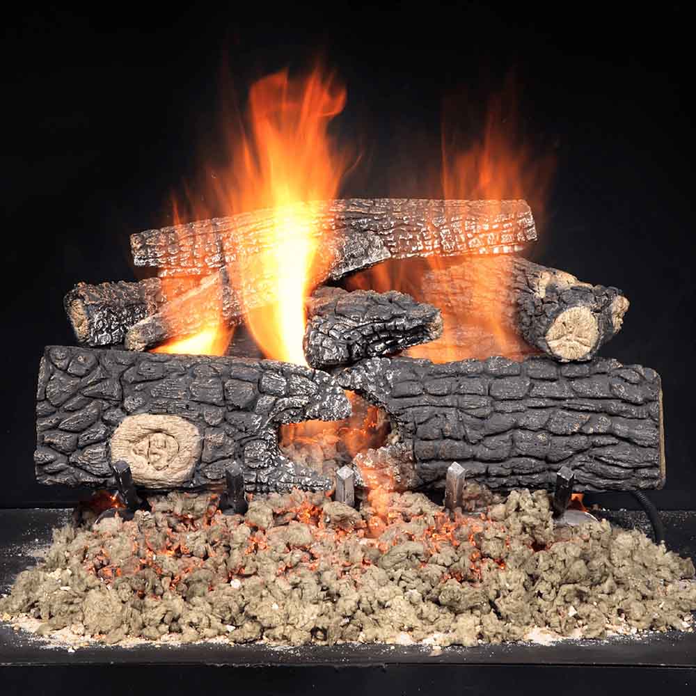 Vented gas log set with glowing flames and stacked charcoal-gray logs
