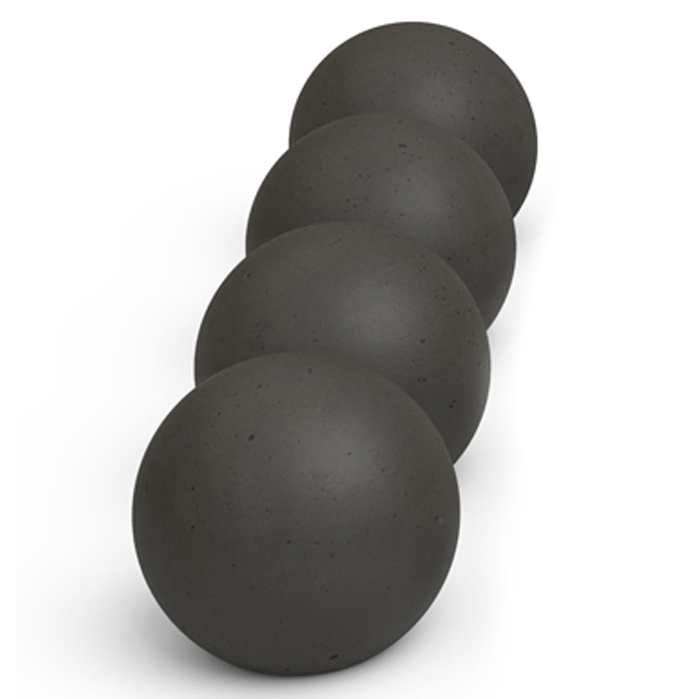 Stack of dark gray matte fire pit spheres