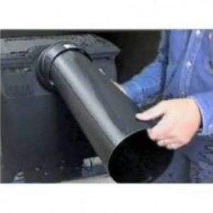 Wall vent duct pipe from a through-wall vent kit, shown being held by a hand
