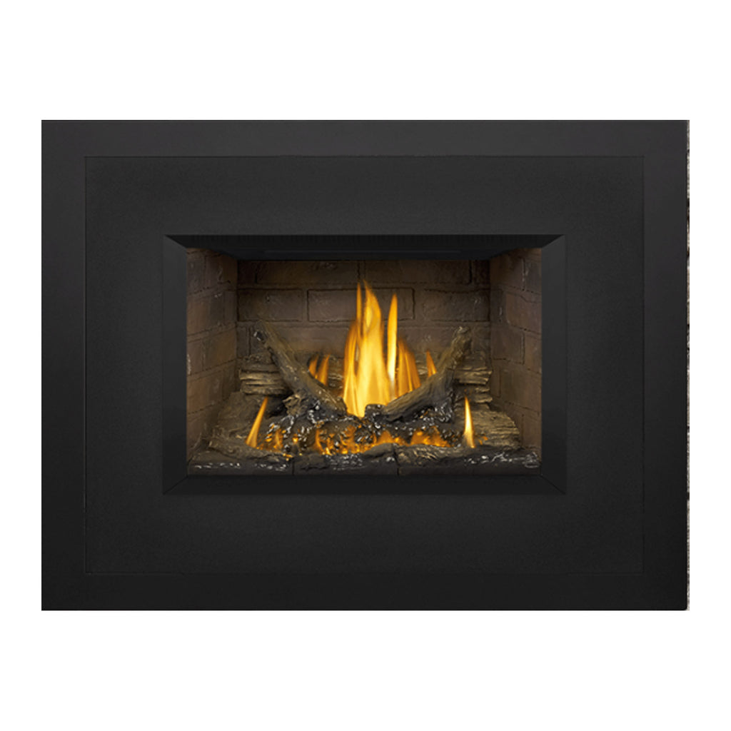 Direct vent gas fireplace insert with dark surround; bright yellow flames and ember-covered logs