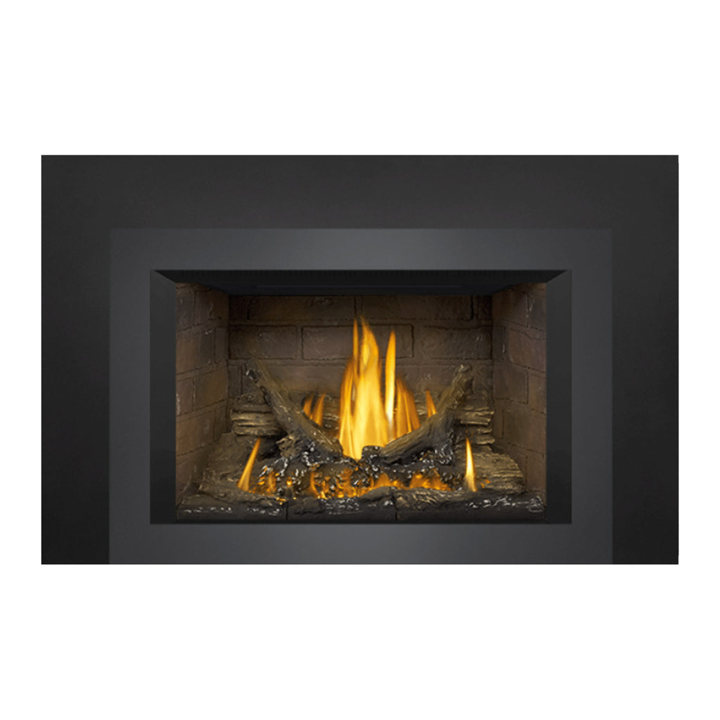 Gas fireplace insert with dark surround, stone-lined firebox and burning logs with flames