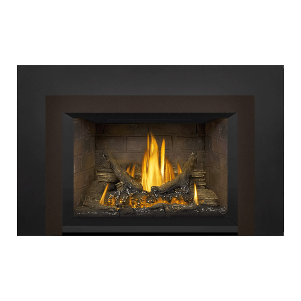 Gas fireplace insert with tan stone firebox and burning logs with flickering flames
