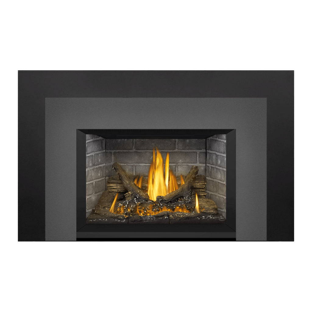 Direct vent gas fireplace insert showing flames and logs in the firebox