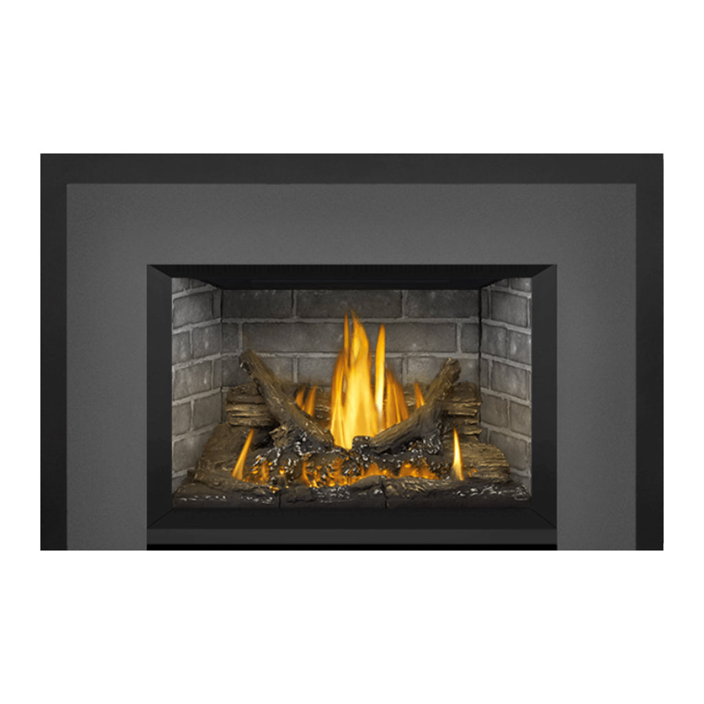Gas fireplace insert with bright flames, logs, and glowing embers inside the frame