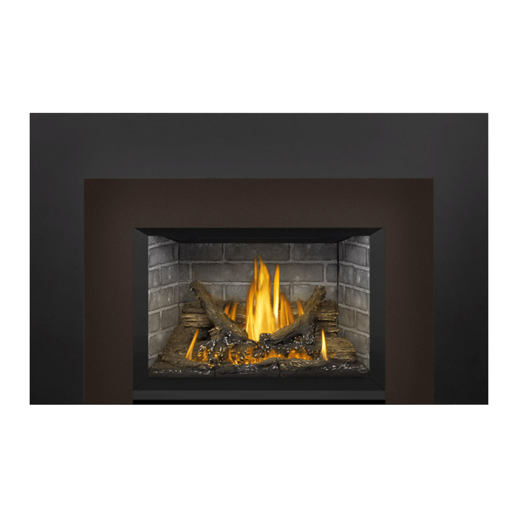 Gas fireplace insert with dark frame and glowing fire flames in a stone-lined box