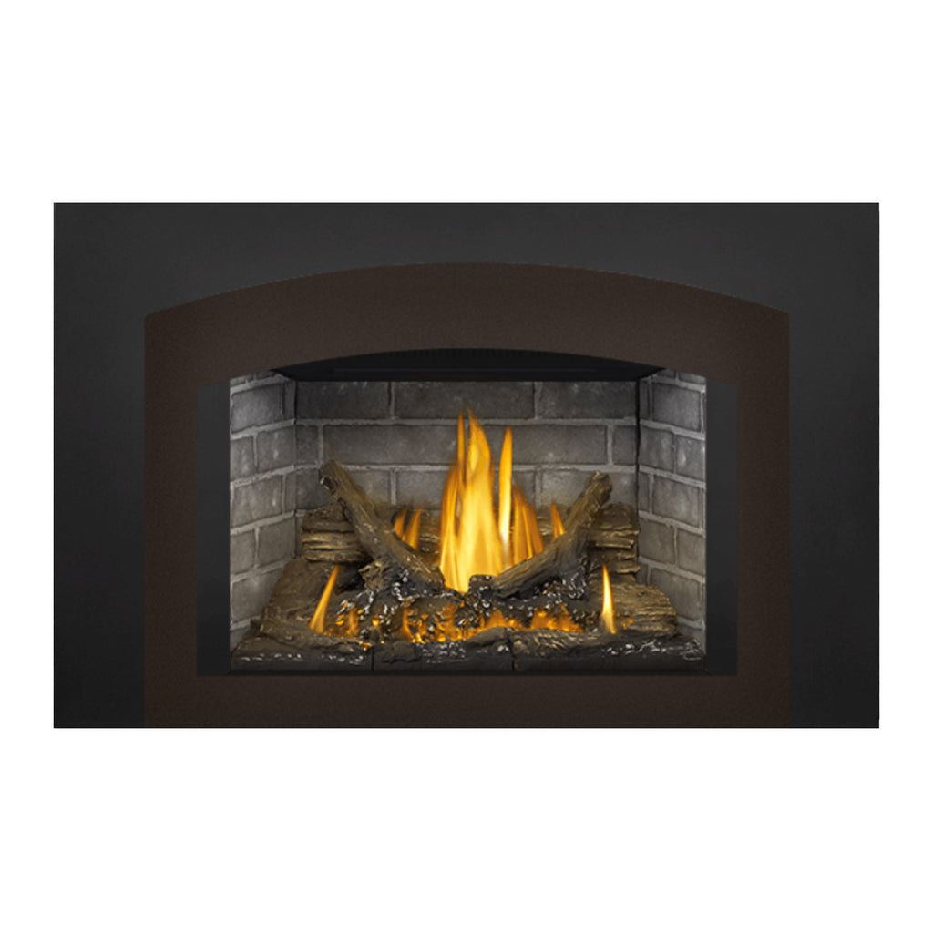 Black direct vent gas fireplace insert with burning logs in stone firebox