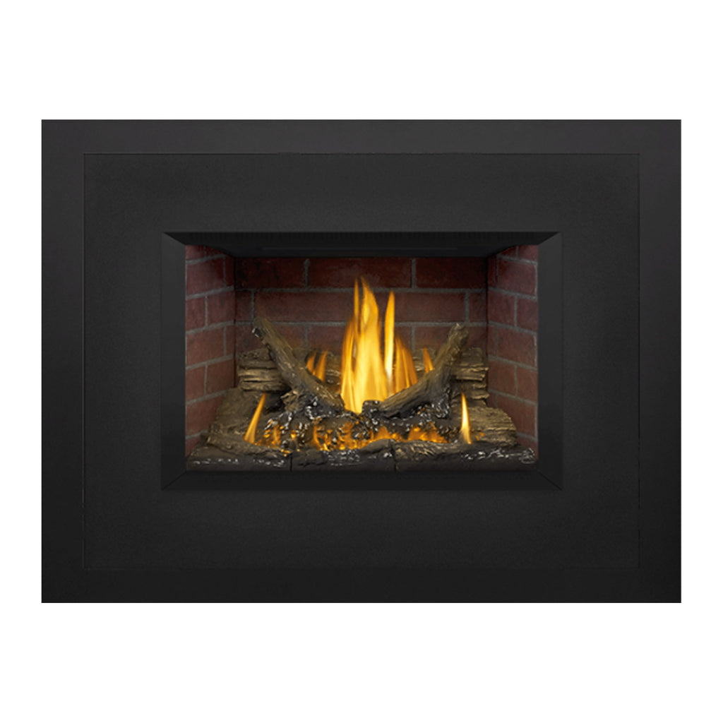 Gas fireplace insert with dark frame, full front view, yellow flames in brick firebox.