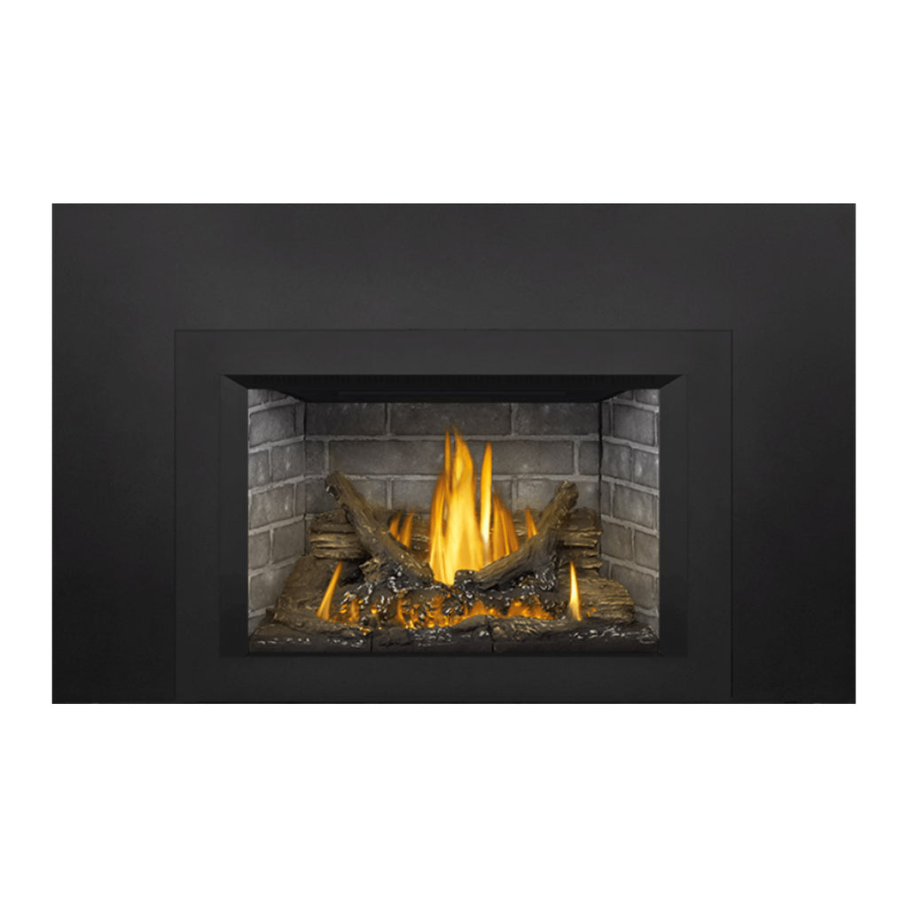 Black direct vent gas fireplace insert with rectangular glass window, flames over logs