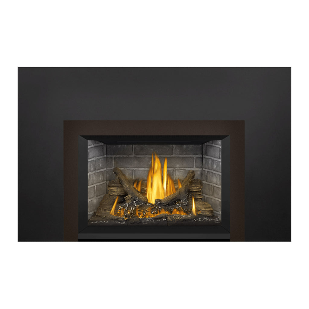 Gas fireplace insert with dark frame, brick firebox, yellow flames over logs and charcoal.