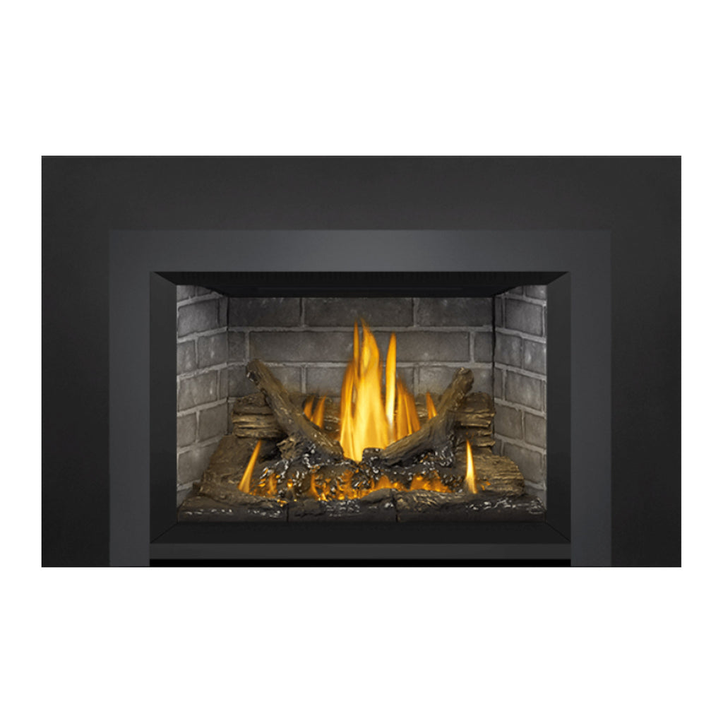 Direct vent gas fireplace insert with central flame and brick firebox with embers