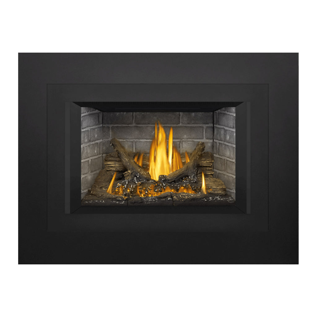 Direct vent gas fireplace insert with dark rectangular frame, brick interior, burning logs and flames