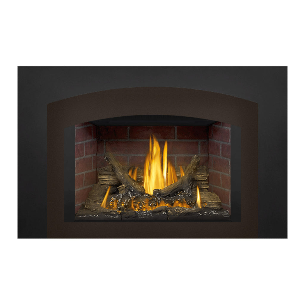 Black gas fireplace insert with arched hood, brick firebox, logs, and yellow flames
