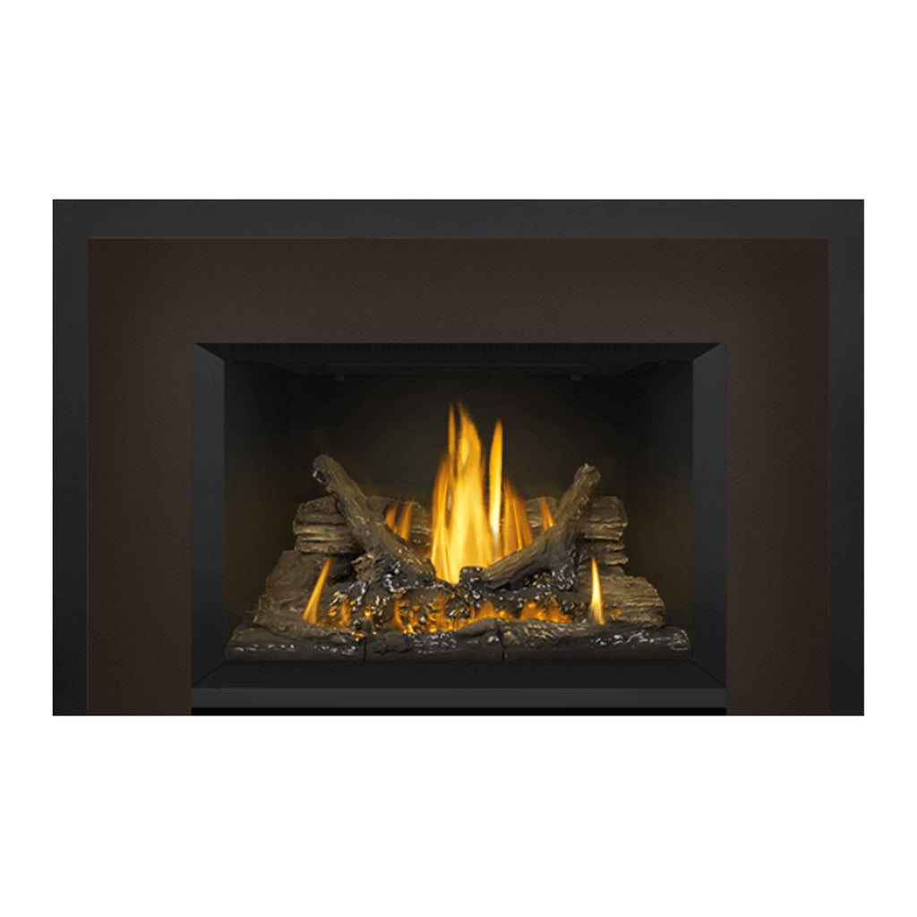 Direct vent gas fireplace insert showing glowing logs, yellow flames, and dark firebox opening