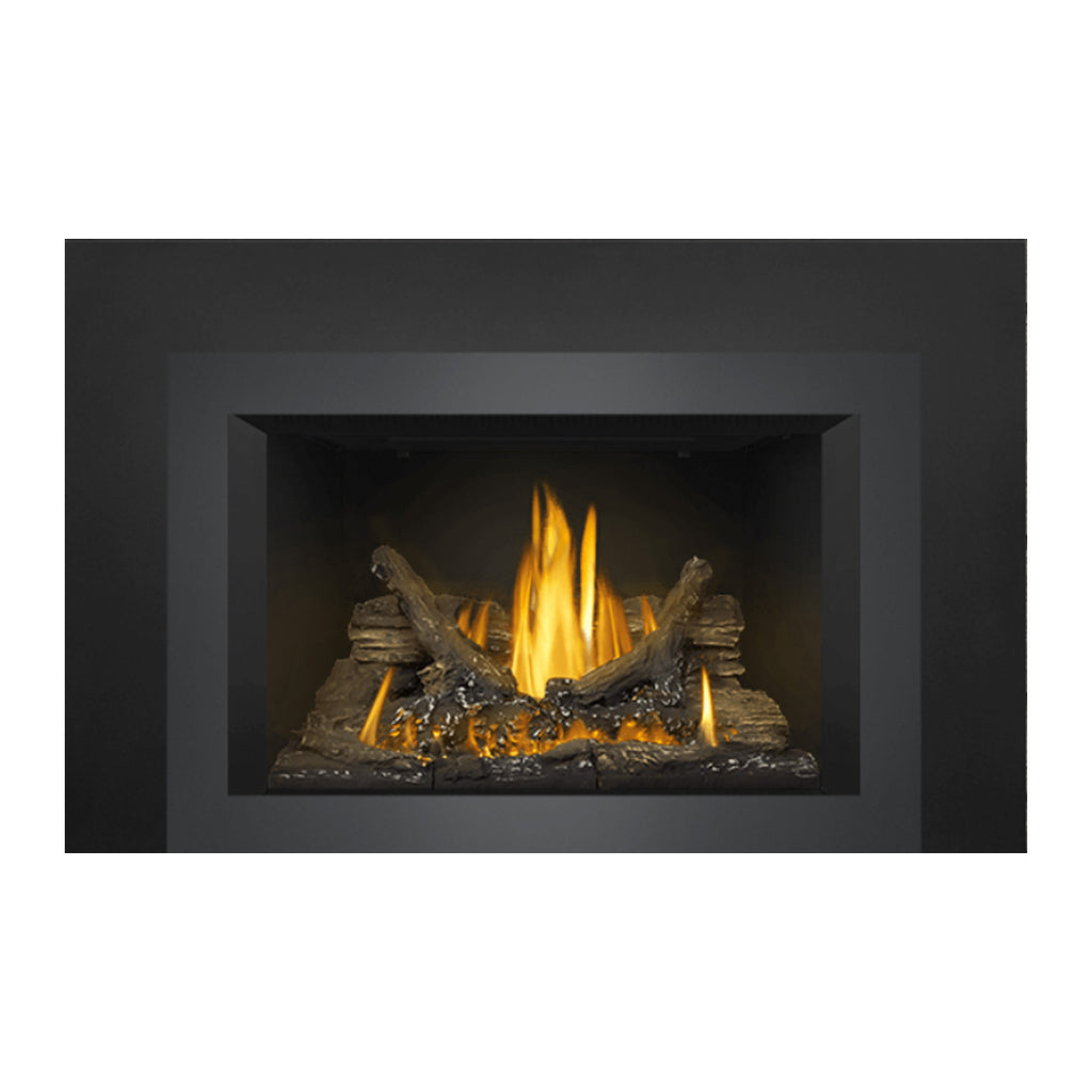 Gas fireplace insert with dark outer frame and glowing fire bed with logs and flames
