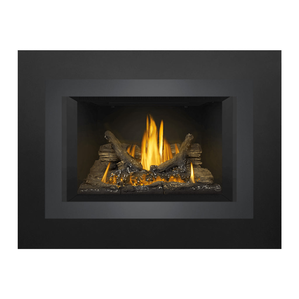 Gas fireplace insert with dark frame and burning logs, flames visible in rectangular firebox