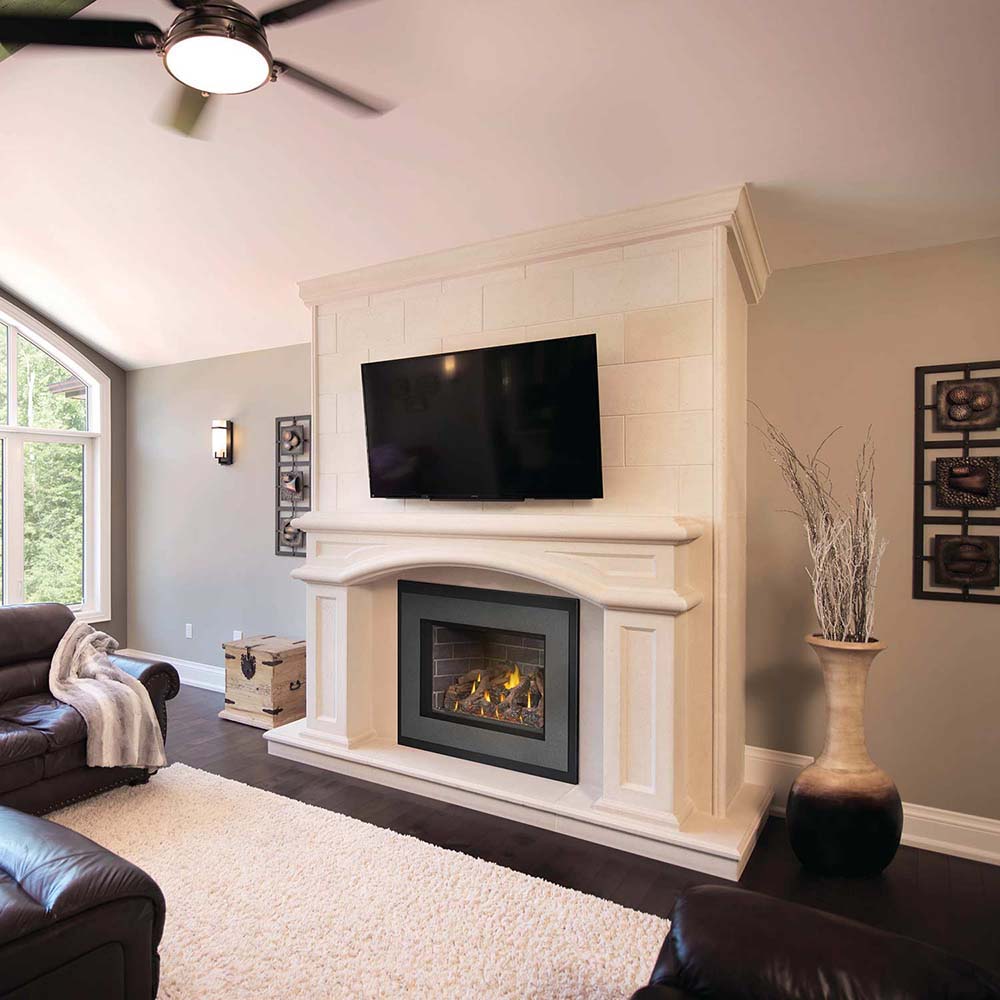 Gas fireplace insert in white mantel surround with burning logs