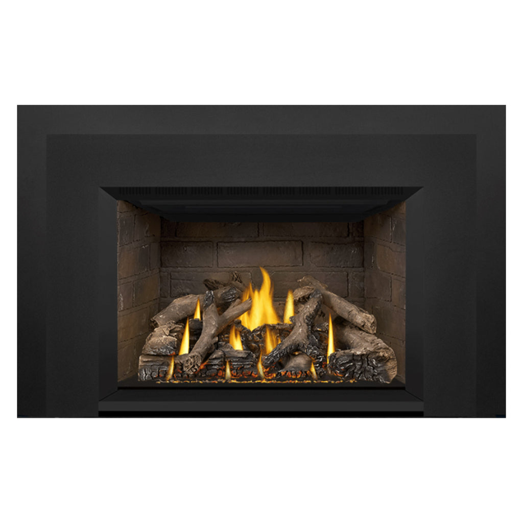 Direct vent gas fireplace insert with black surround, visible flames, and dark gray log pieces
