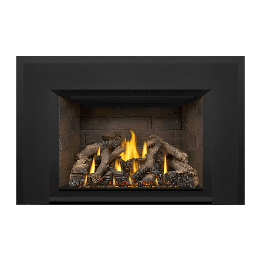 Direct vent gas fireplace insert with black surround and flame-lit log bed centered in opening