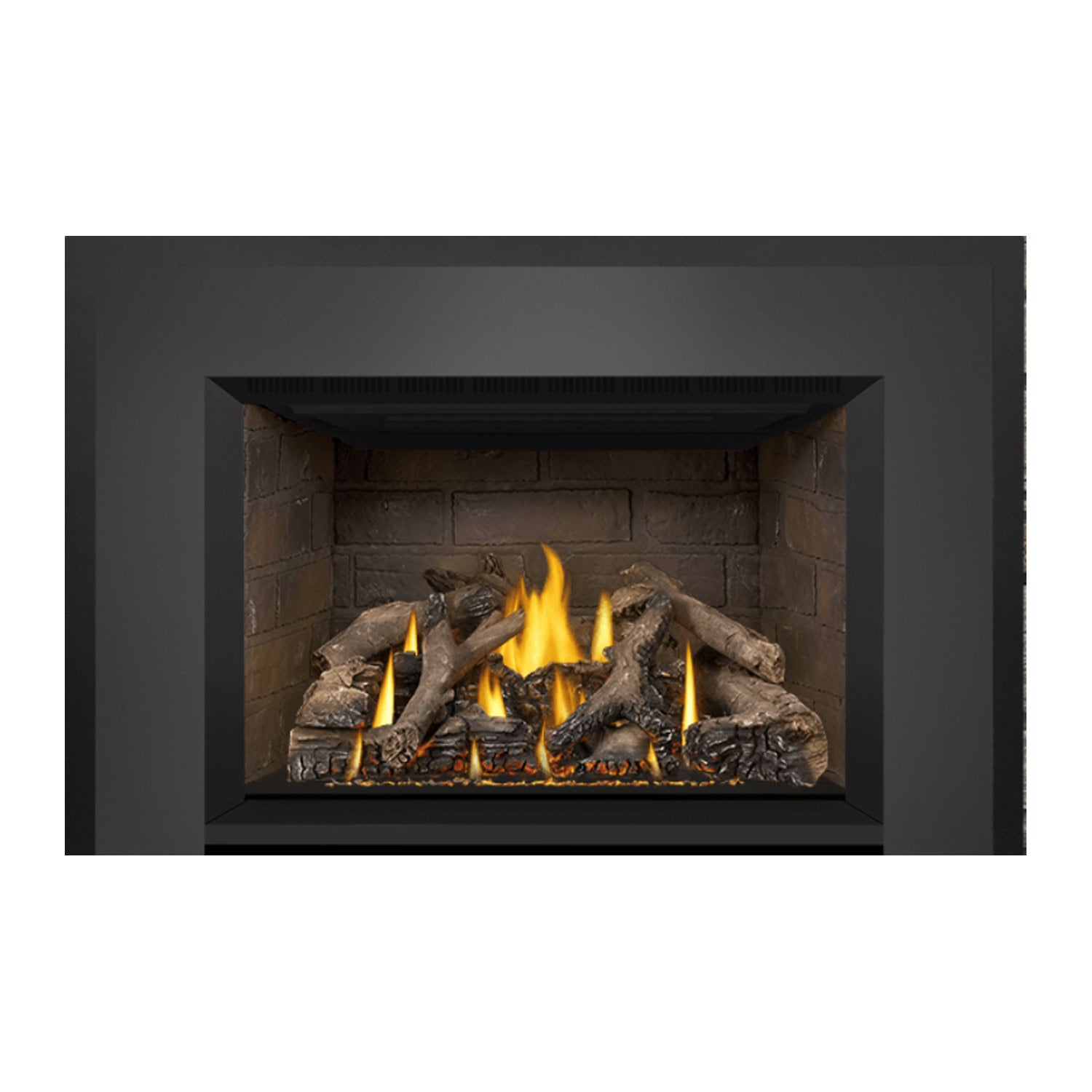Gas fireplace insert view with stone firebox and burning logs under a black hood.