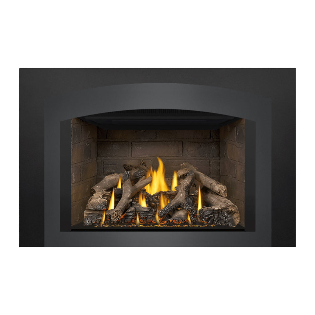 Direct vent gas fireplace insert with arched black trim and burning log bed with yellow flames