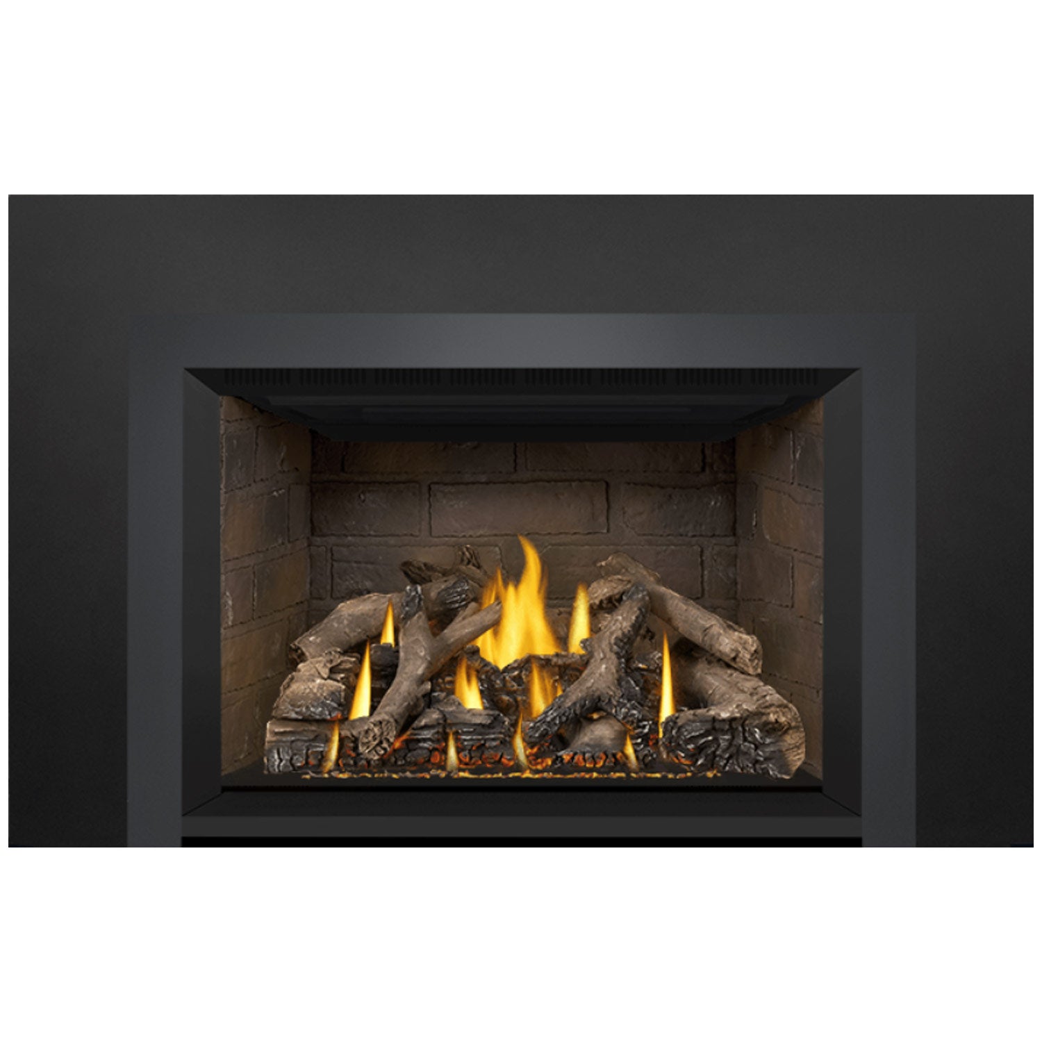 Gas fireplace insert with glowing flames and dark log pieces in a rectangular opening