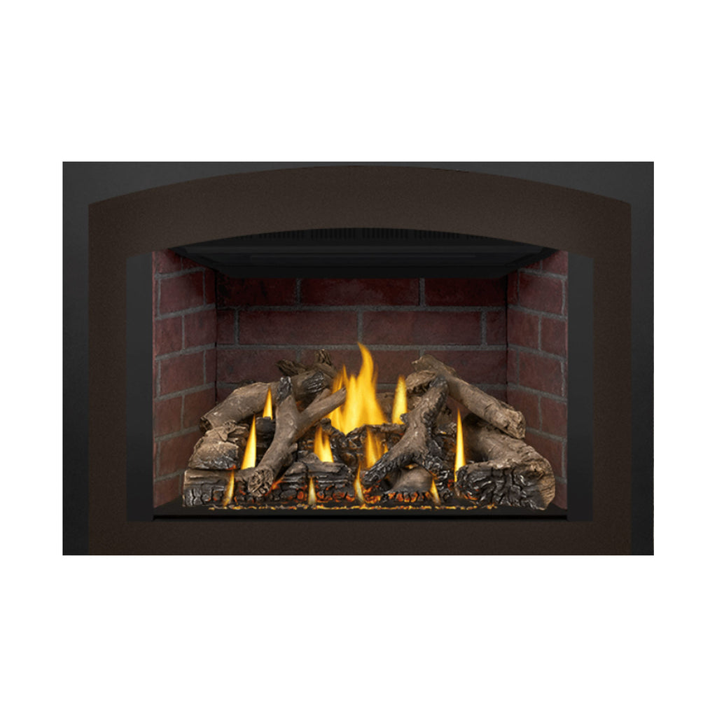 Direct vent gas fireplace insert with burning flames and log set in brick surround