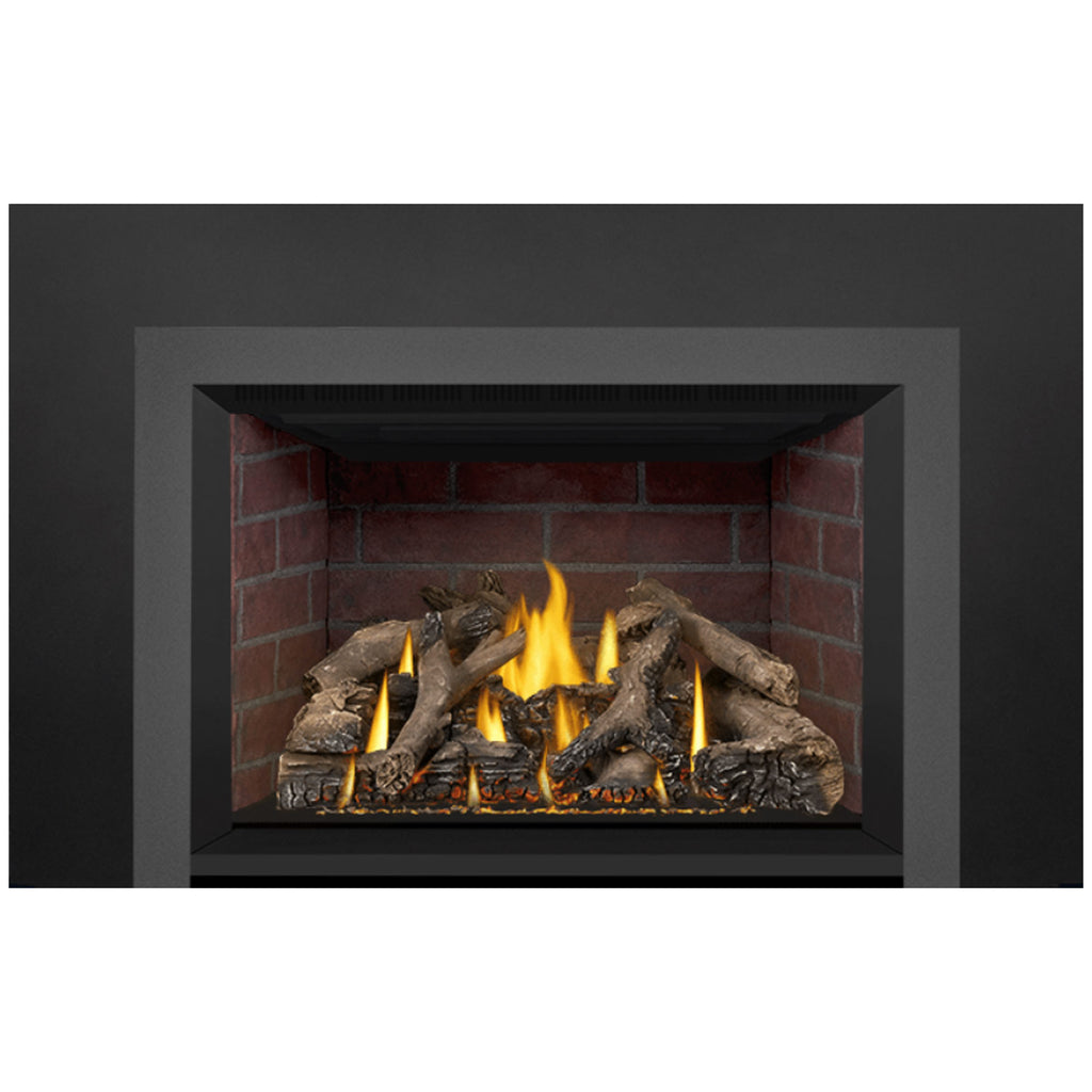 Direct vent gas fireplace insert with glowing flames in front firebox and logs