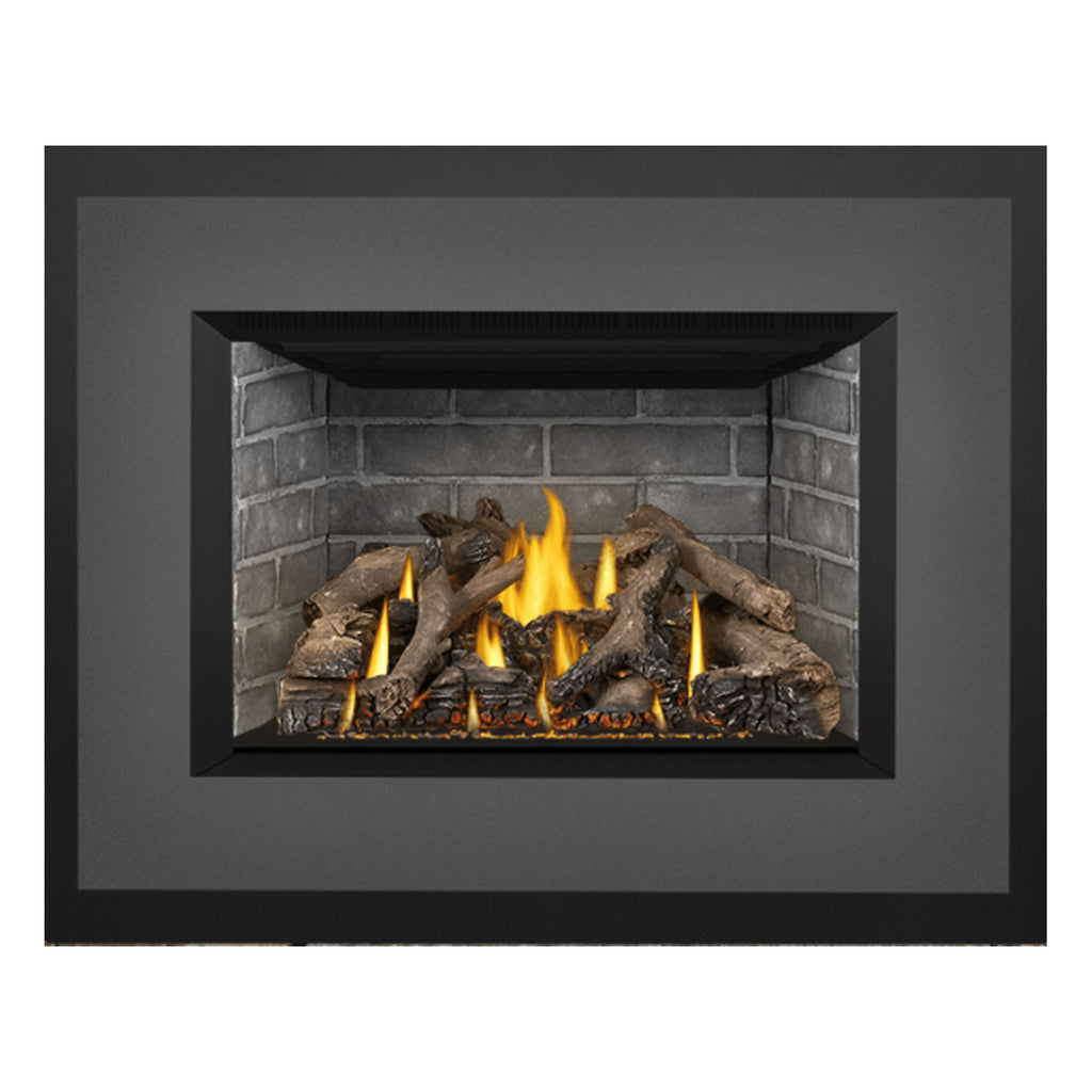 Direct vent gas fireplace insert, dark surround around stone firebox with burning logs